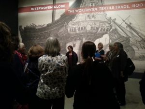 The program’s participants and the curators at the entrance to the exhibit.