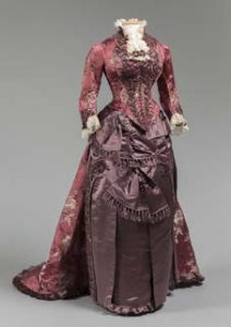 Dinner Dress, Levillon, Paris, circa 1875. Likely worn by Sara Jane Wilcox Hitchcock (Mrs. Peter Marshall); Gift of Mrs. H.R. Hatch III, 79.58.1 a,b “In Grand Style” curated by Susan Neill. (c) Western Reserve Historical So- ciety;