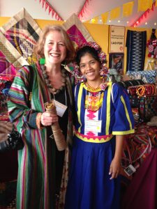 Karin Hazelkorn (TSA member) and Philippine weaver at her booth (2014) Photo: E. Phipps