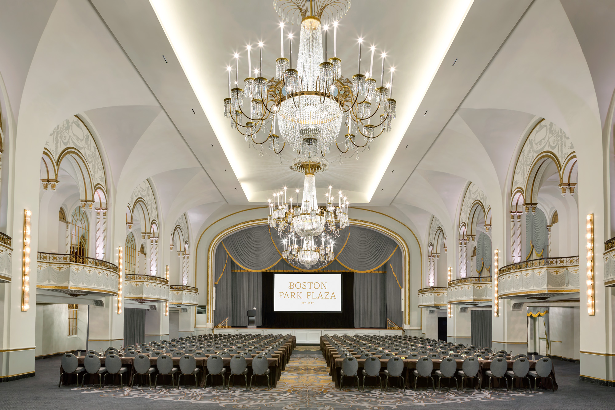 Boston Park Plaza Ballroom, with audience seating, balconies, and chandeliers.