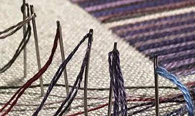 Threaded embroidery needles