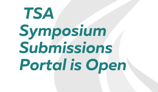 A simple graphic for TSA's 2024 Symposium of words on top of a gray swirl graphic. The announcement is "TSA Symposium Submissions Portal is Open"